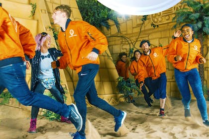 People running in Aztec zone at Crystal Maze experience